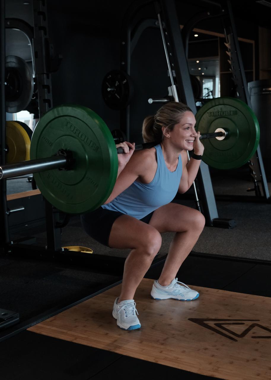 Netballer performing a squat